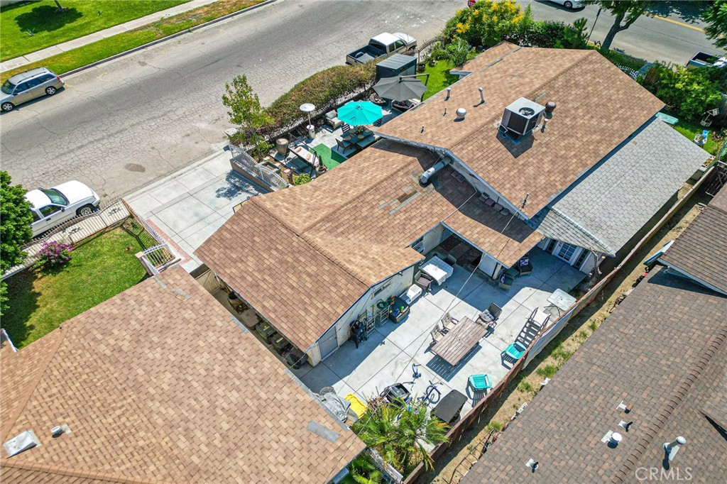 491 East C Street Colton, CA 92324 - Photo 58 of 58 an aerial view of a house with a yard