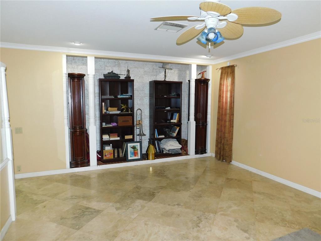 155 Marshall Street Safety Harbor, FL 34695 - Photo 14 of 62 a view of a storage & utility room with a window