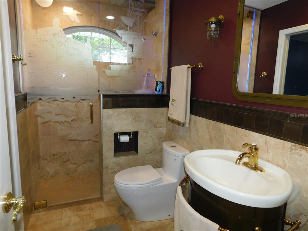 155 Marshall Street Safety Harbor, FL 34695 - Photo 21 of 62 a bathroom with a sink and a mirror