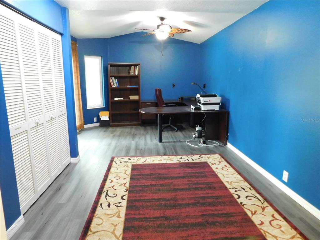 155 Marshall Street Safety Harbor, FL 34695 - Photo 23 of 62 a room with wooden floor and pool table