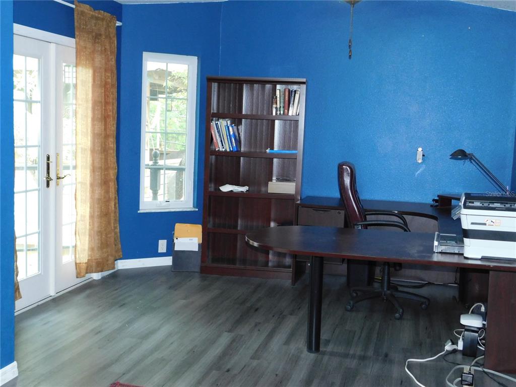 155 Marshall Street Safety Harbor, FL 34695 - Photo 24 of 62 a view of a workspace with furniture and a window