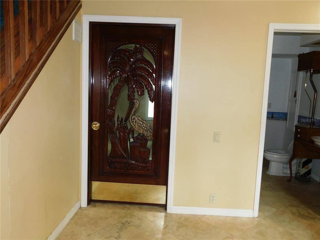 155 Marshall Street Safety Harbor, FL 34695 - Photo 33 of 62 a view of walk in closet with clothes and shoes