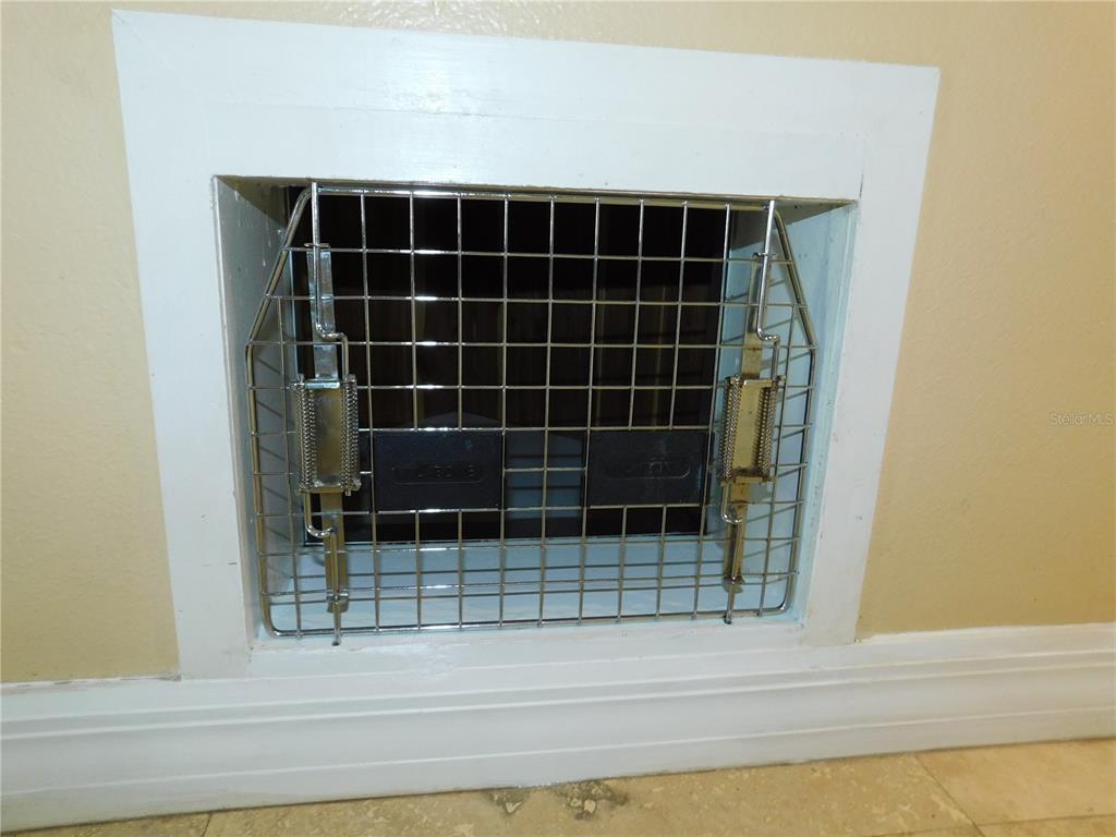 155 Marshall Street Safety Harbor, FL 34695 - Photo 35 of 62 a view of a door and a wooden bench