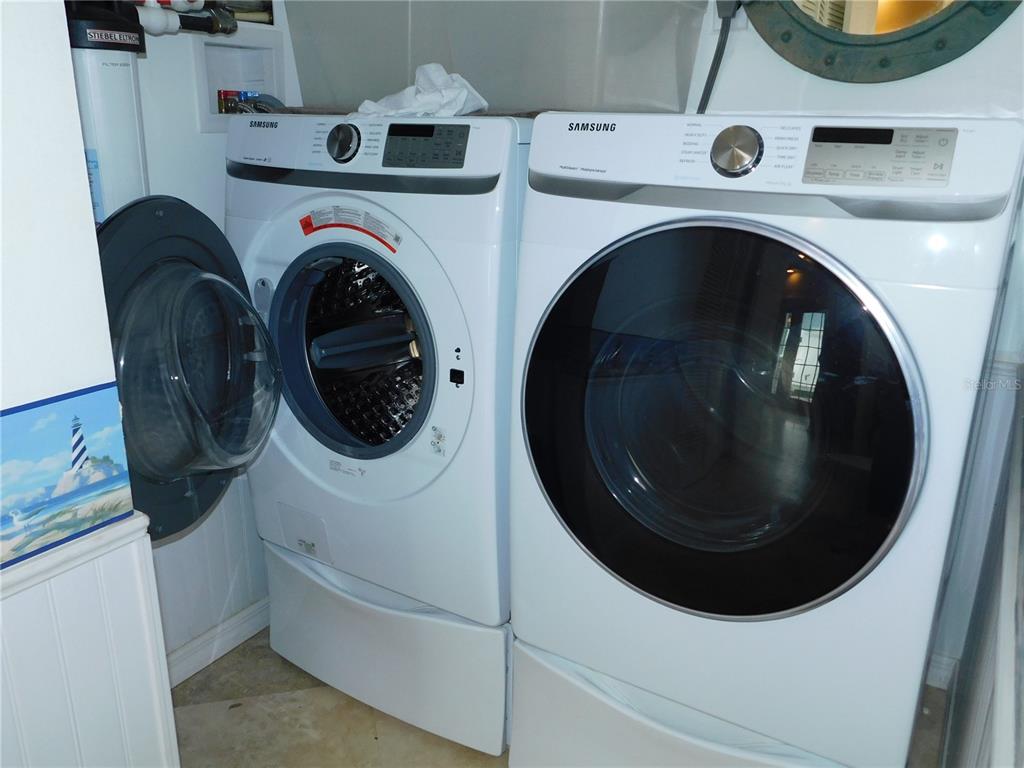 155 Marshall Street Safety Harbor, FL 34695 - Photo 37 of 62 a utility room with dryer and washer