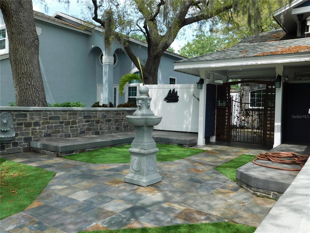 155 Marshall Street Safety Harbor, FL 34695 - Photo 61 of 62 a front view of a house with garden