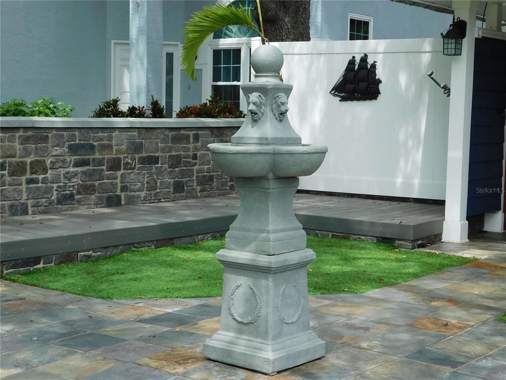 155 Marshall Street Safety Harbor, FL 34695 - Photo 62 of 62 a view of a fountain in the patio with a fountain