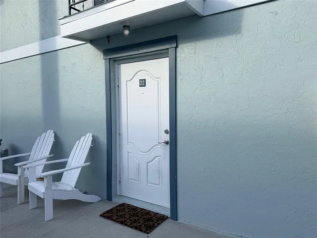a view of chair and table in a bathroom