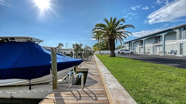 a house with swimming pool in front of it