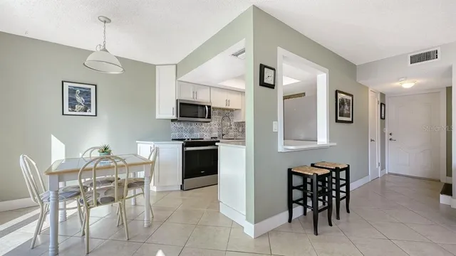 a view of a dining room with furniture