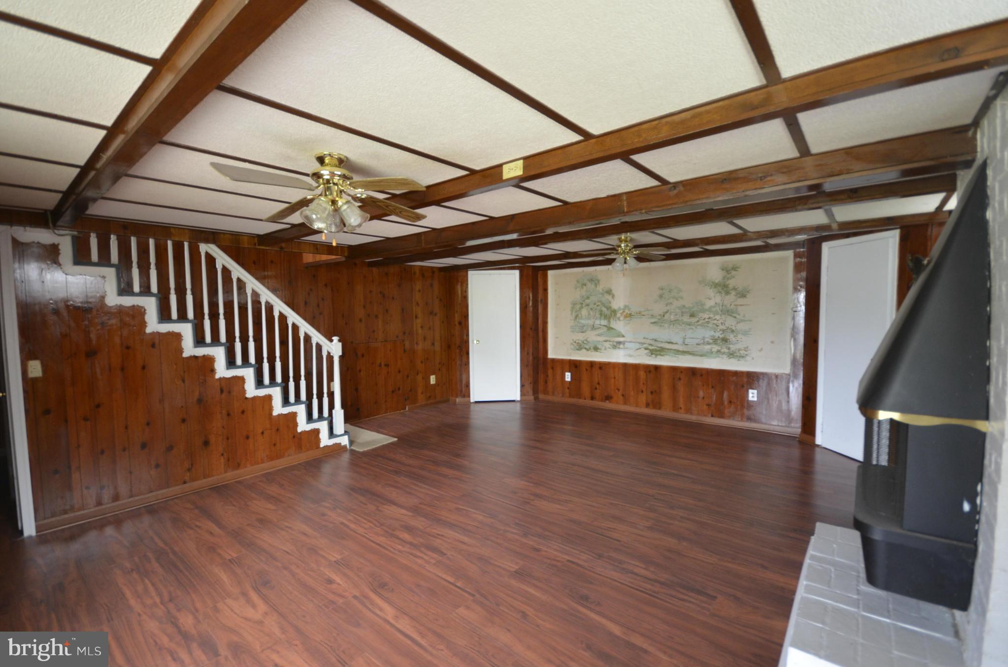 5646 Calyn Road Baltimore, MD 21207 - Photo 14 of 16 a view of an entryway with wooden floor