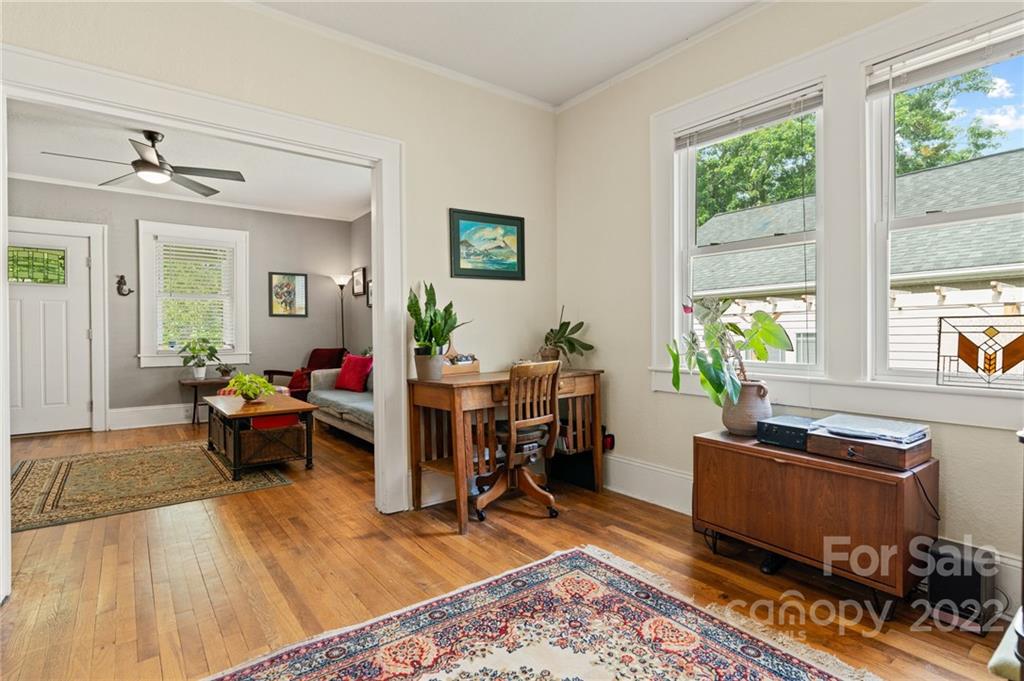 136 Round Top Road Asheville, NC 28803 - Photo 13 of 34 a living room with furniture and a window