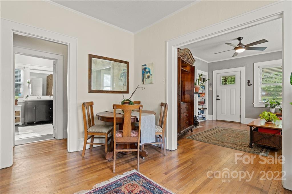 136 Round Top Road Asheville, NC 28803 - Photo 14 of 34 a living room with furniture and wooden floor