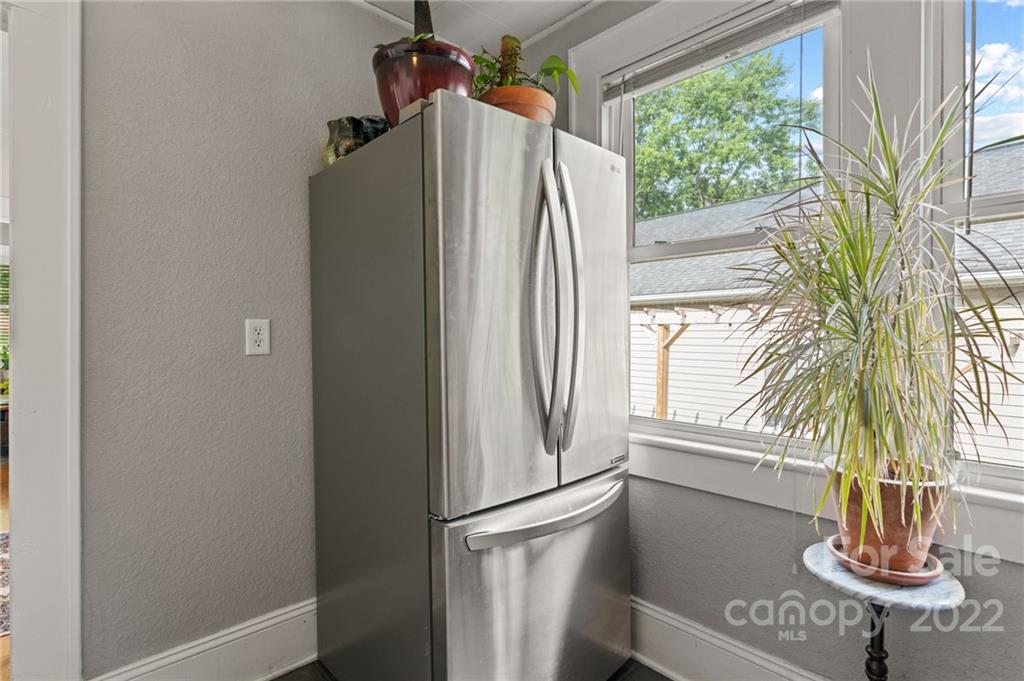 136 Round Top Road Asheville, NC 28803 - Photo 19 of 34 a view of a kitchen with a sink and a window