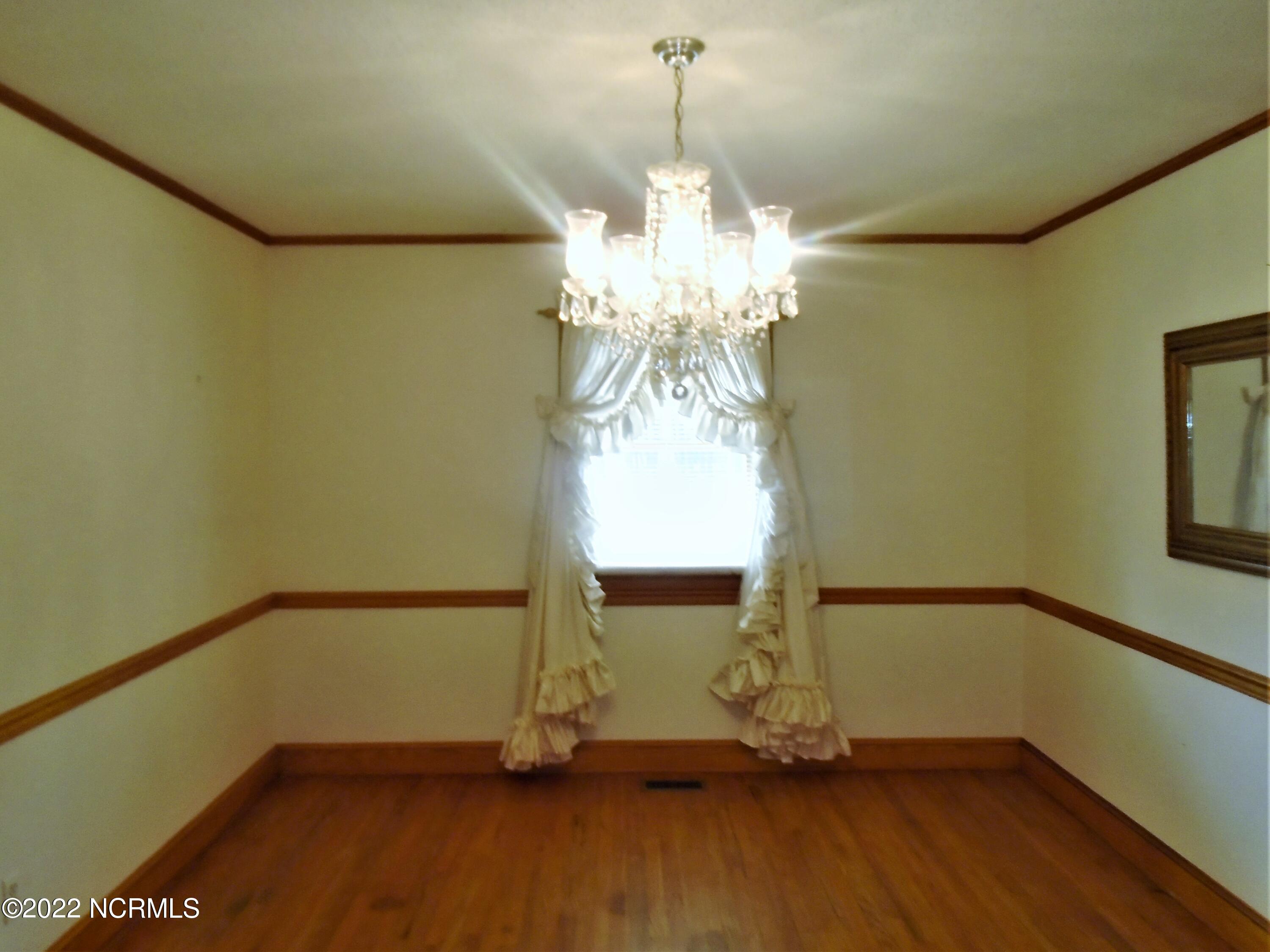 222 Brake Road Rocky Mount, NC 27801 - Photo 19 of 39 Formal Dining Room with hardwoods