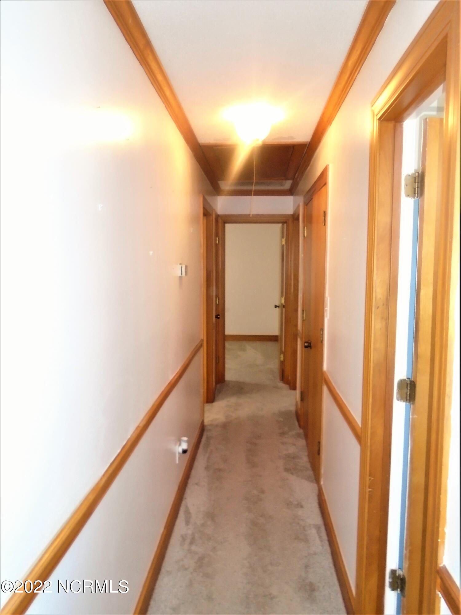 222 Brake Road Rocky Mount, NC 27801 - Photo 27 of 39 Hallway to bedrooms