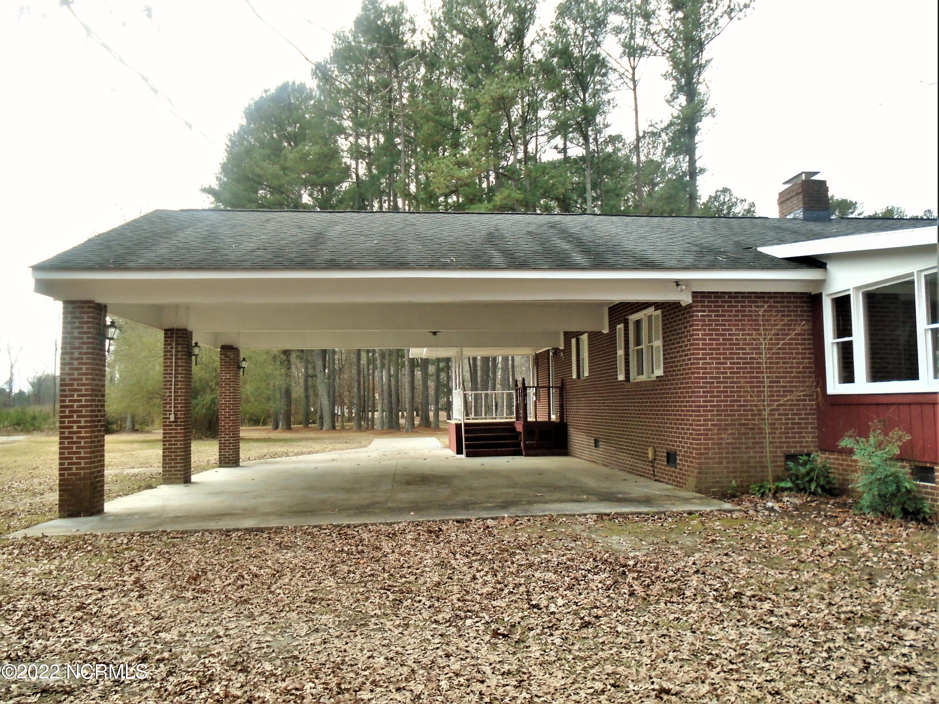 222 Brake Road Rocky Mount, NC 27801 - Photo 8 of 39 Rear view of carport