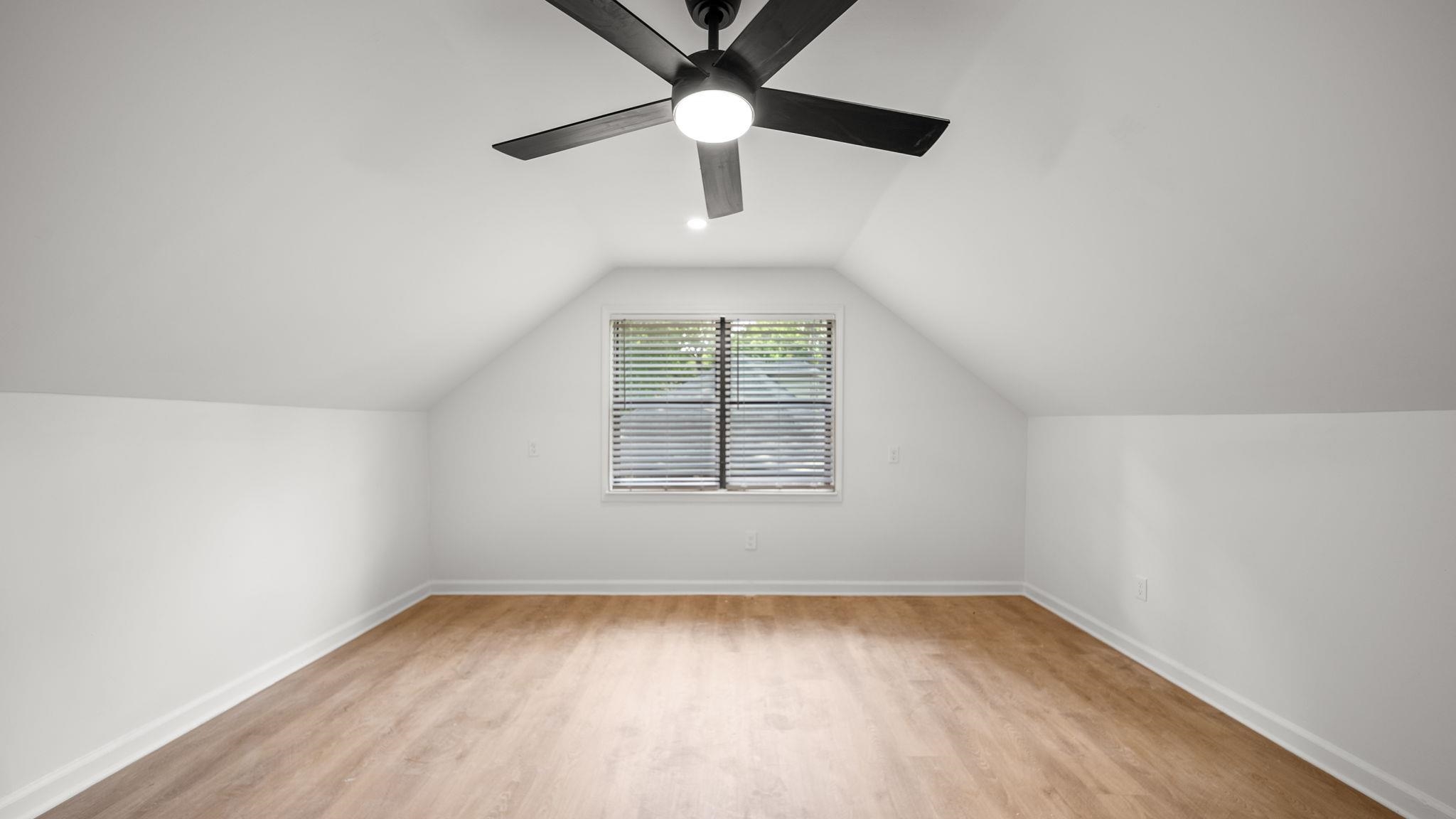4351 Spring Oak Cove Memphis, TN 38125 - Photo 36 of 40 an empty room with a window and a fan