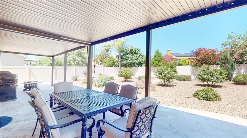 1279 Longbranch Road San Jacinto, CA 92582 - Photo 13 of 35 a view of a dining room with furniture window and outside view