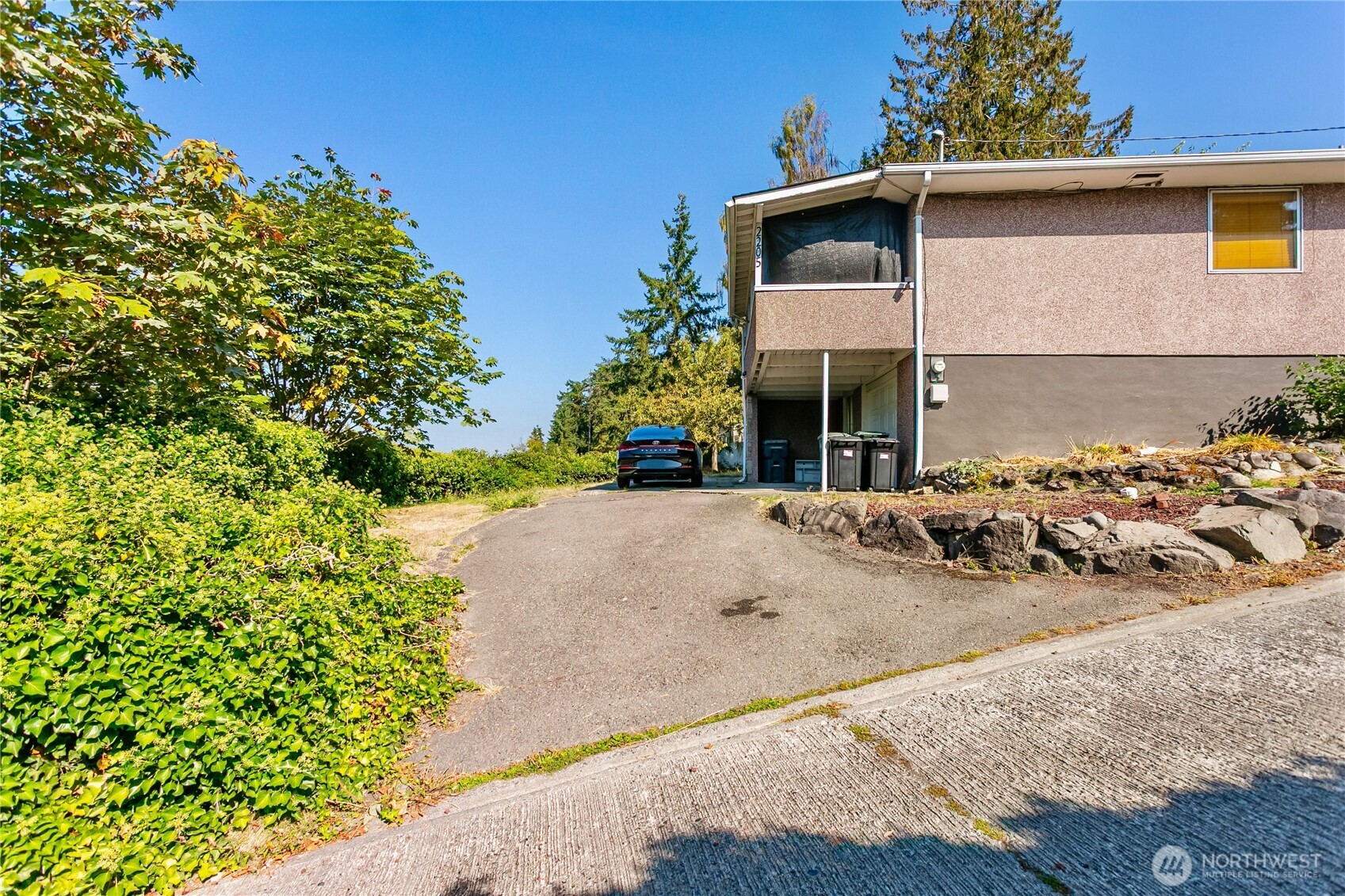 2205 South Meridian Puyallup, WA 98372 - Photo 18 of 39 front view of a house with a porch