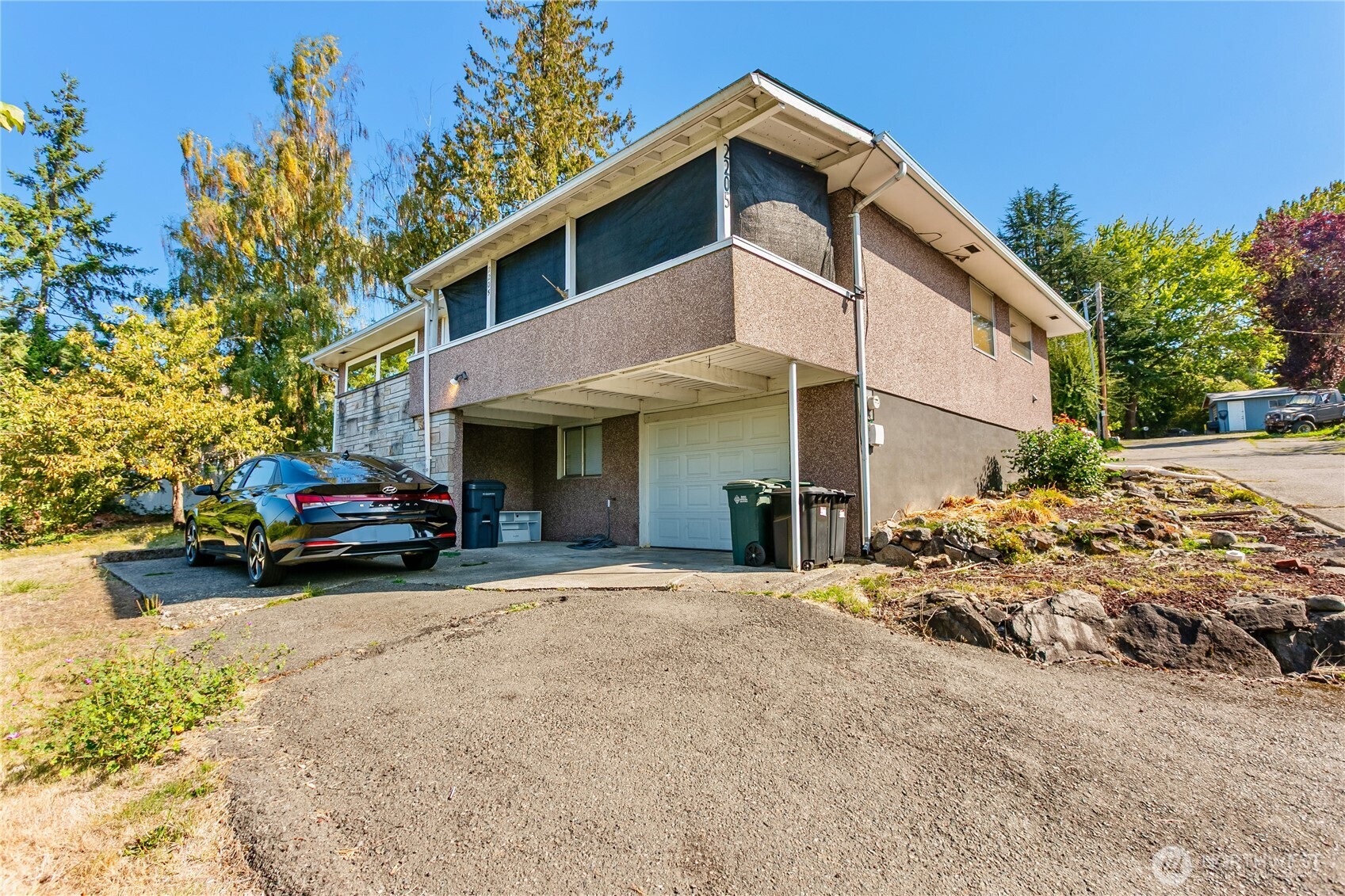 2205 South Meridian Puyallup, WA 98372 - Photo 19 of 39 a view of a car park in front of house