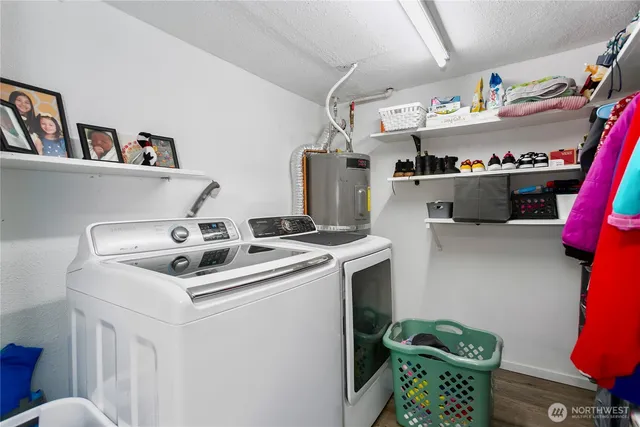 a utility room with dryer and washer