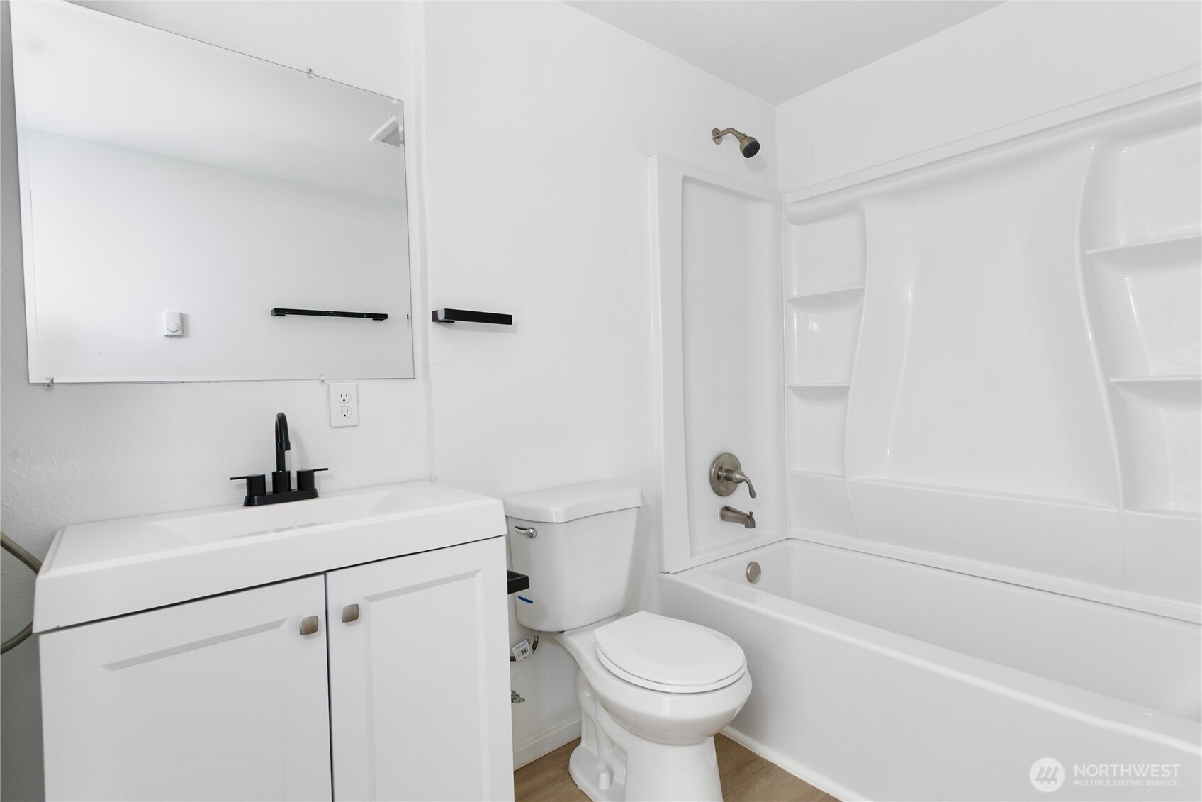 2205 South Meridian Puyallup, WA 98372 - Photo 34 of 39 a bathroom with a sink a toilet and a bathtub