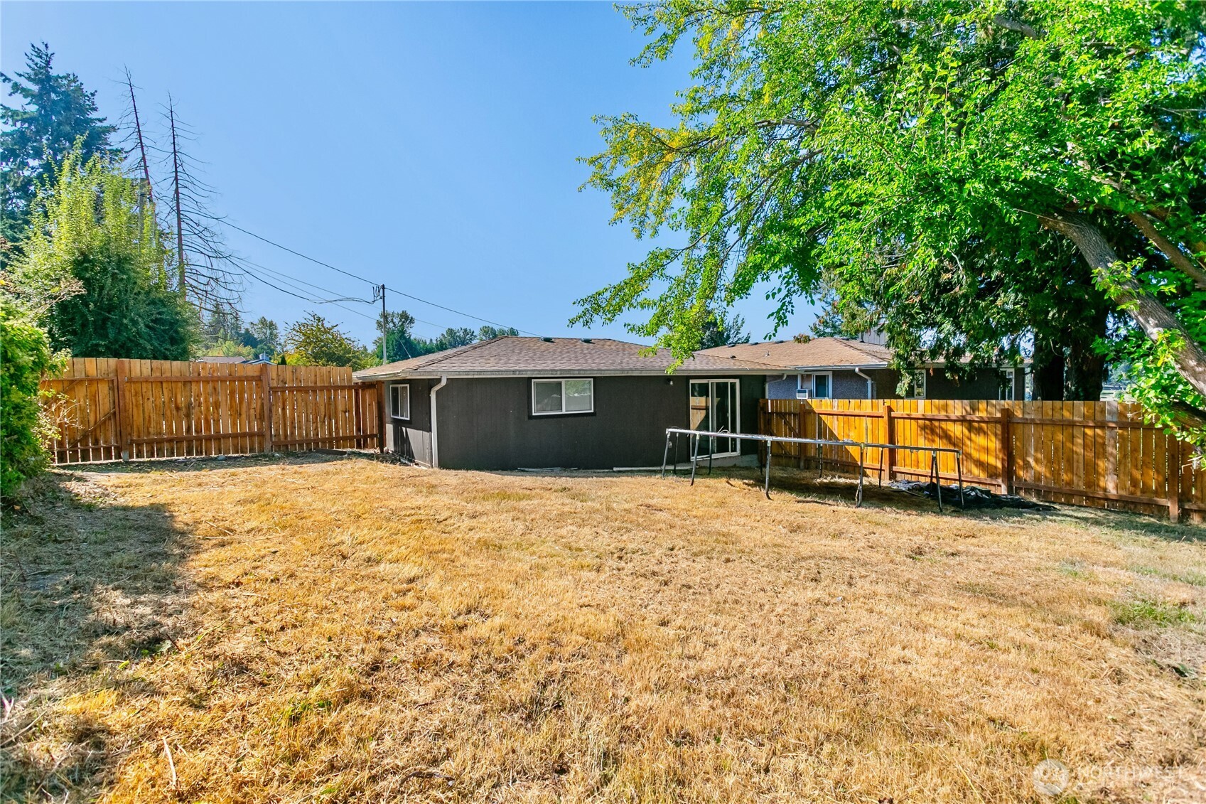 2205 South Meridian Puyallup, WA 98372 - Photo 38 of 39 a house with trees in the background