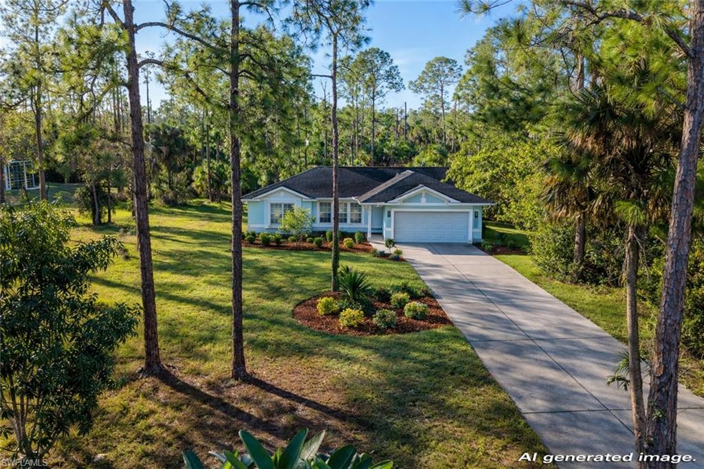 3330 12th Avenue Southeast Naples, FL 34117 - Photo 2 of 9 a view of a house with a yard