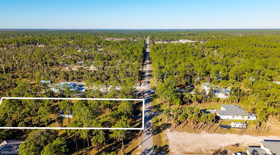 3330 12th Avenue Southeast Naples, FL 34117 - Photo 6 of 9 a view of a balcony with an outdoor space