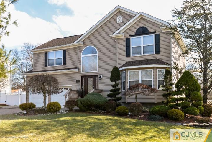 135 Disbrow Road Old Bridge, NJ 07747 - Photo 1 of 25 a front view of a house with garden