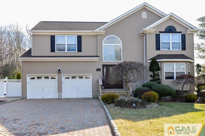 135 Disbrow Road Old Bridge, NJ 07747 - Photo 2 of 25 a front view of a house with garden