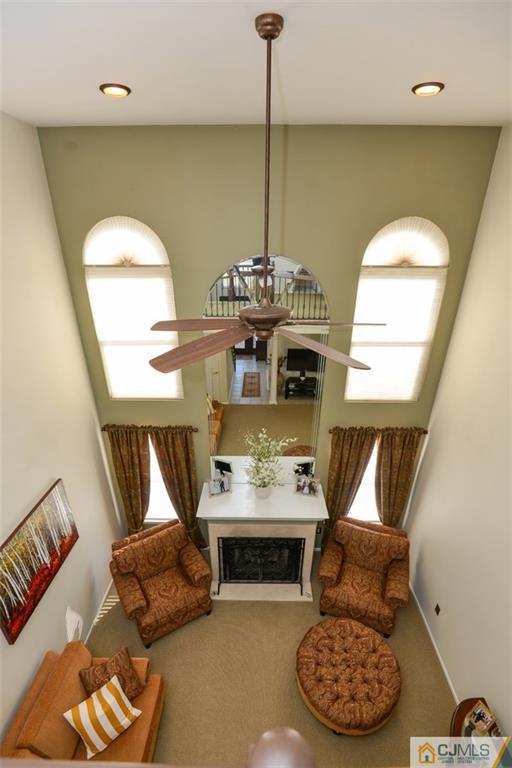 135 Disbrow Road Old Bridge, NJ 07747 - Photo 13 of 25 a living room with furniture and a fireplace