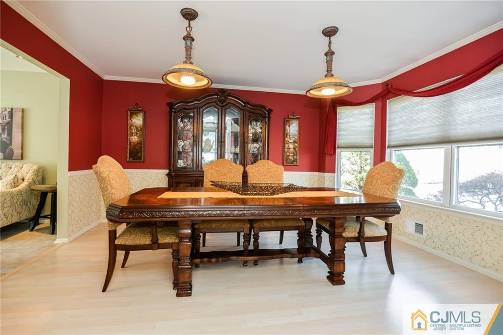 135 Disbrow Road Old Bridge, NJ 07747 - Photo 16 of 25 a view of a dining room with furniture window and outside view
