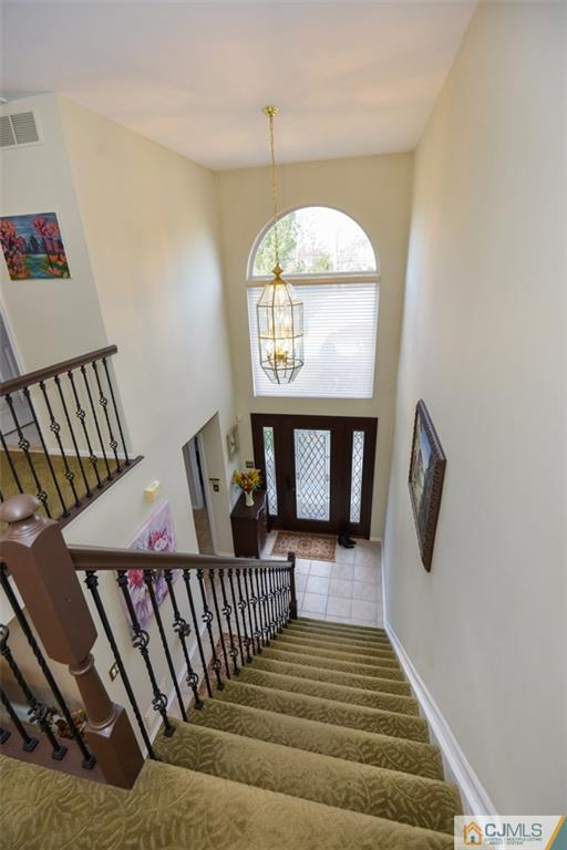 135 Disbrow Road Old Bridge, NJ 07747 - Photo 21 of 25 a view of entryway and hall with wooden floor