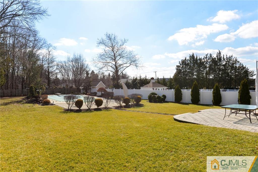 135 Disbrow Road Old Bridge, NJ 07747 - Photo 4 of 25 a view of a swimming pool with an outdoor space