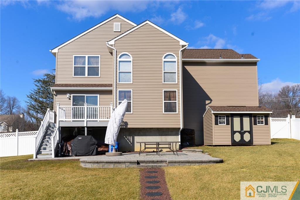 135 Disbrow Road Old Bridge, NJ 07747 - Photo 5 of 25 a front view of a house with large windows