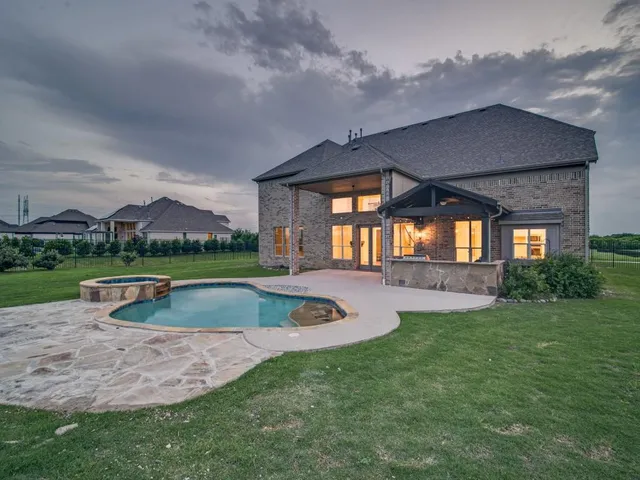 a view of a house with a big yard