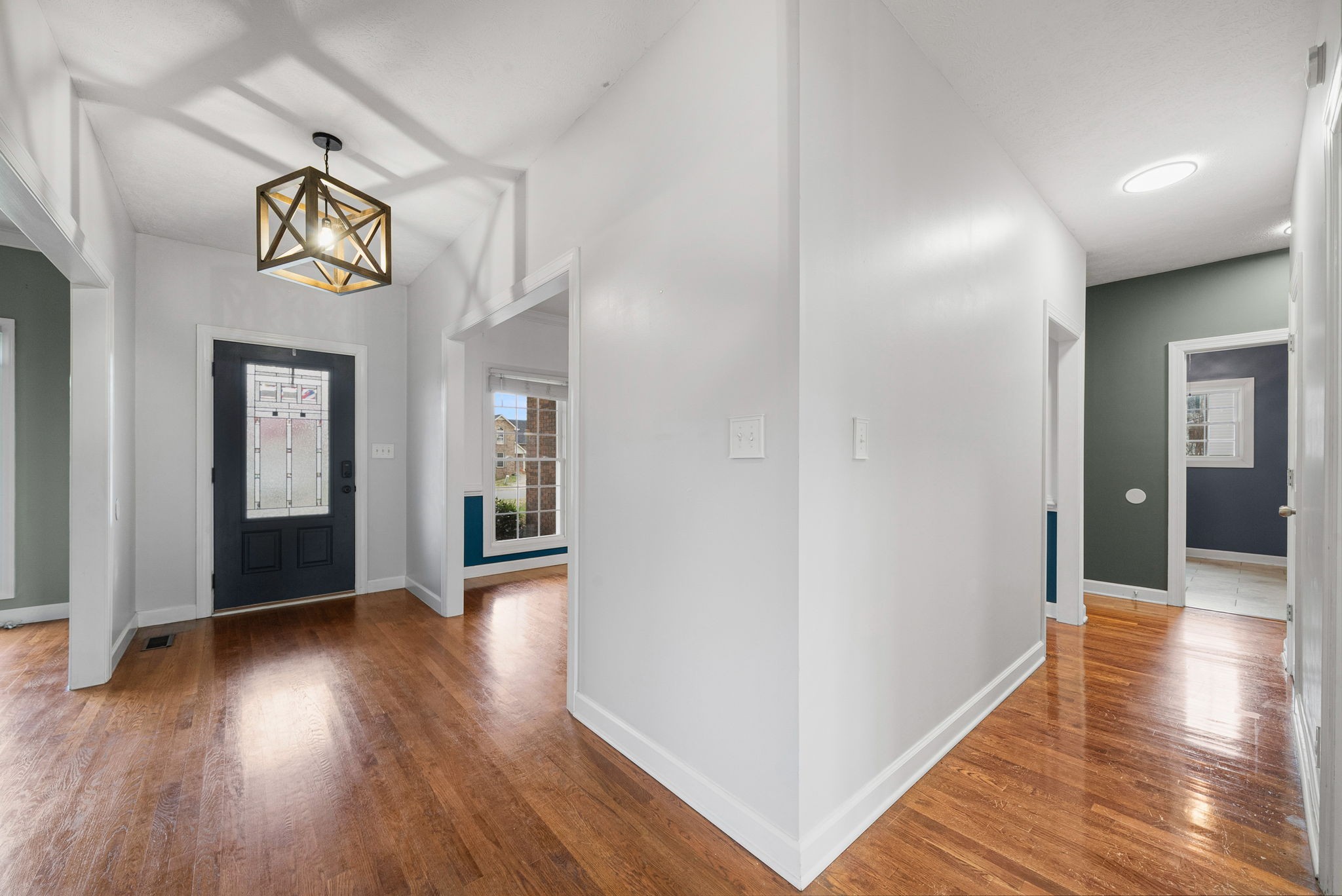 1026 Bluejay Lane Adams, TN 37010 - Photo 12 of 56 a view of hallway with wooden floor