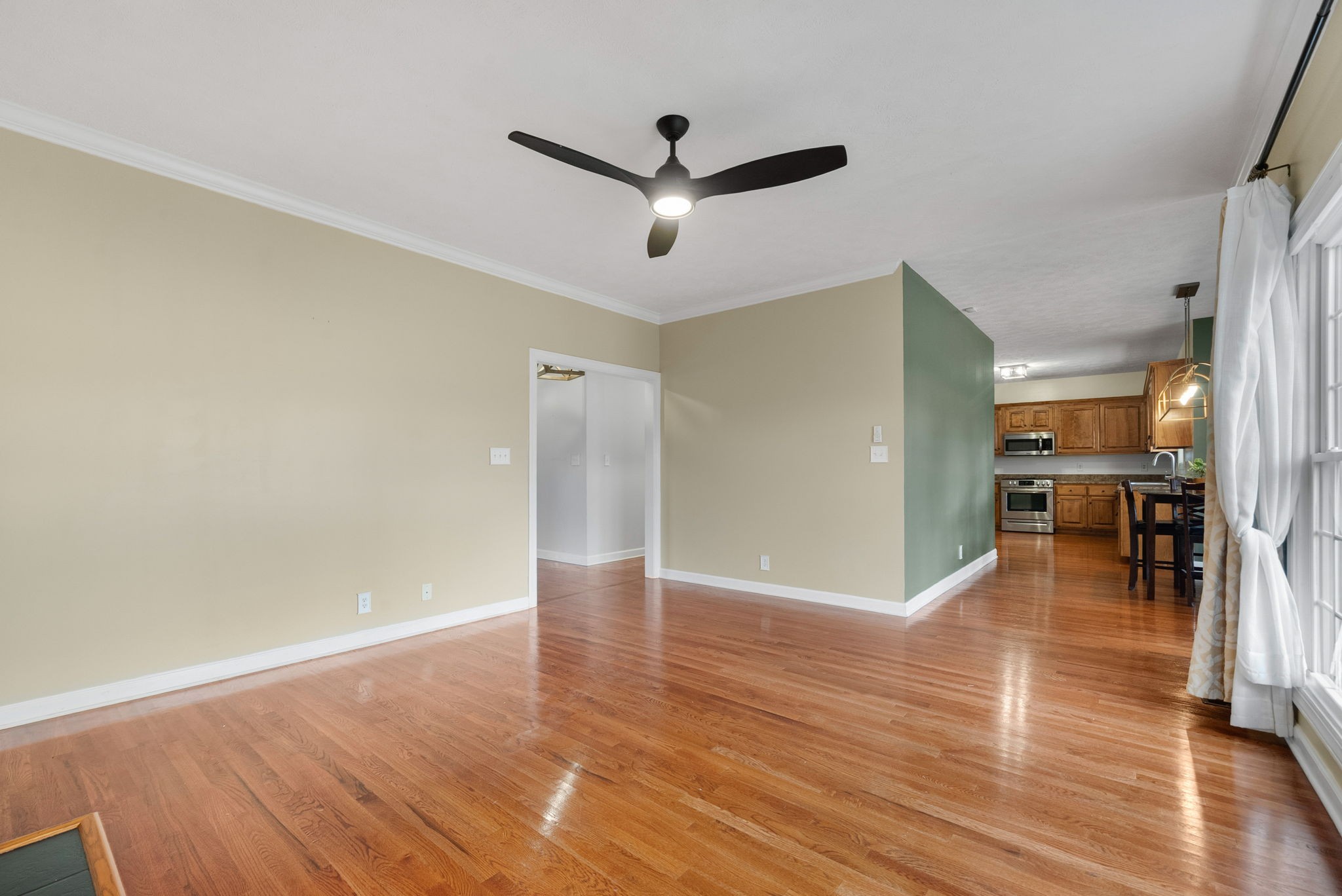 1026 Bluejay Lane Adams, TN 37010 - Photo 17 of 56 a view of empty room with wooden floor