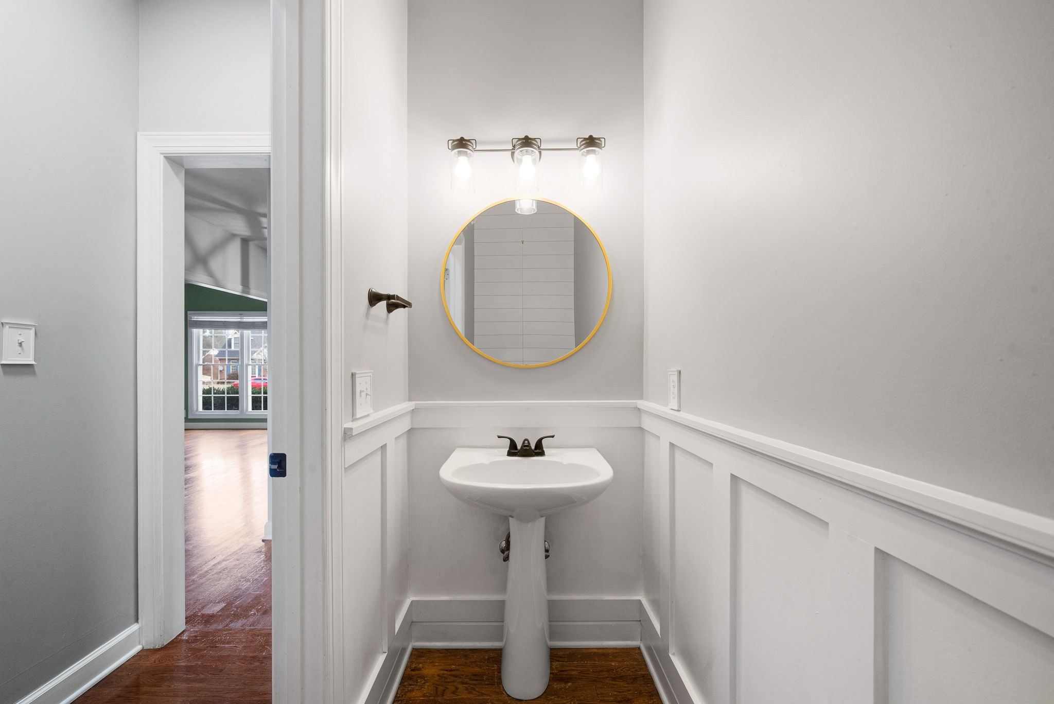 1026 Bluejay Lane Adams, TN 37010 - Photo 18 of 56 a bathroom with a sink and a mirror