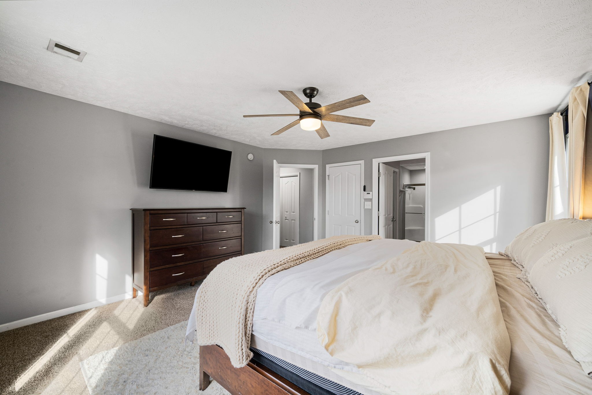 1026 Bluejay Lane Adams, TN 37010 - Photo 29 of 56 a bedroom with a bed and a flat screen tv