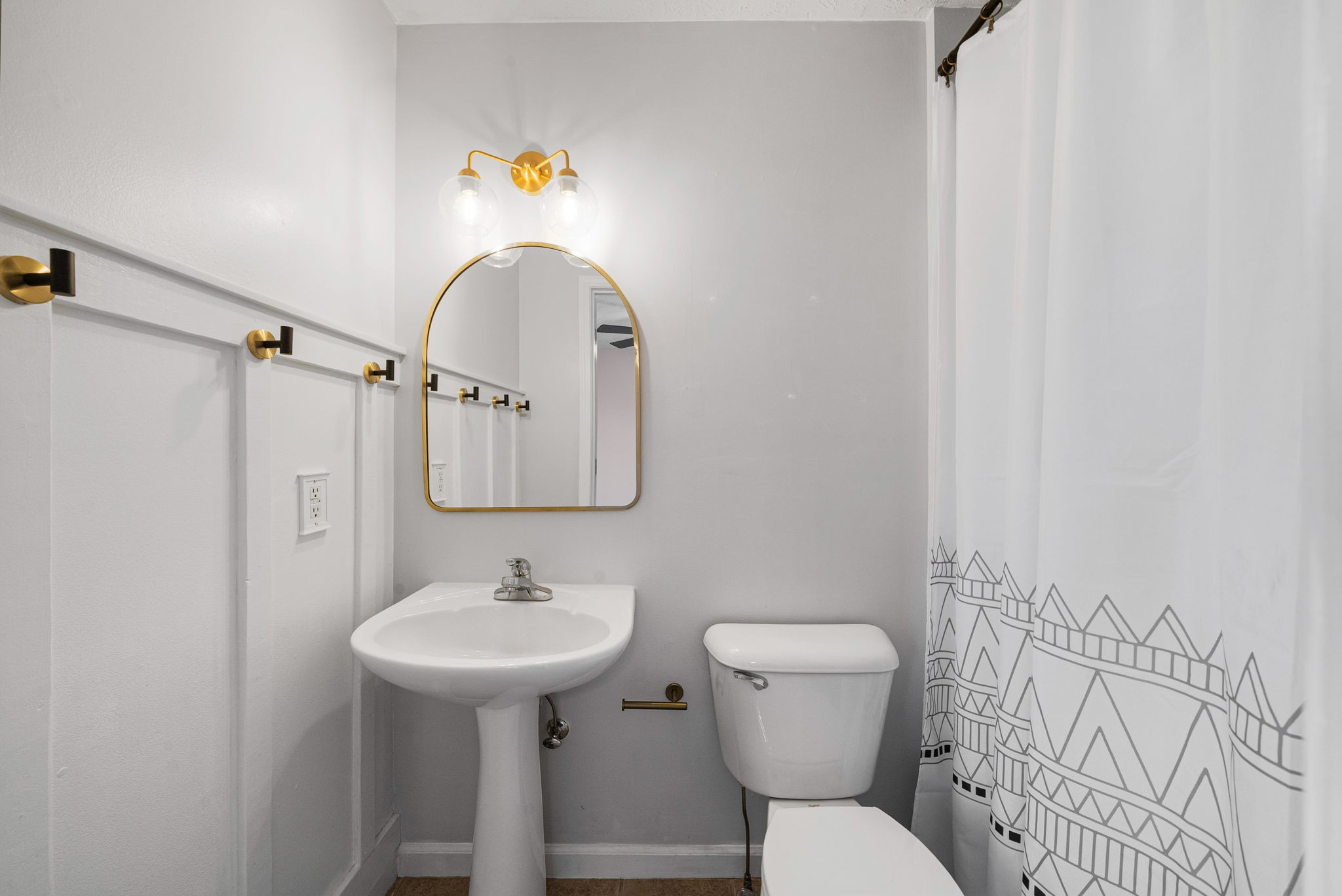1026 Bluejay Lane Adams, TN 37010 - Photo 41 of 56 a bathroom with a sink a toilet and a mirror