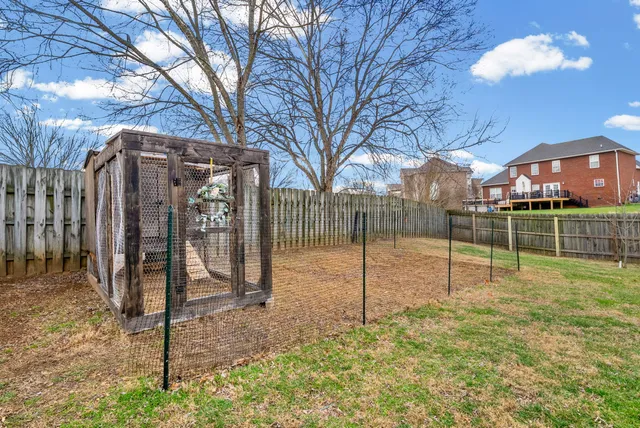 a view of residential houses with outdoor space