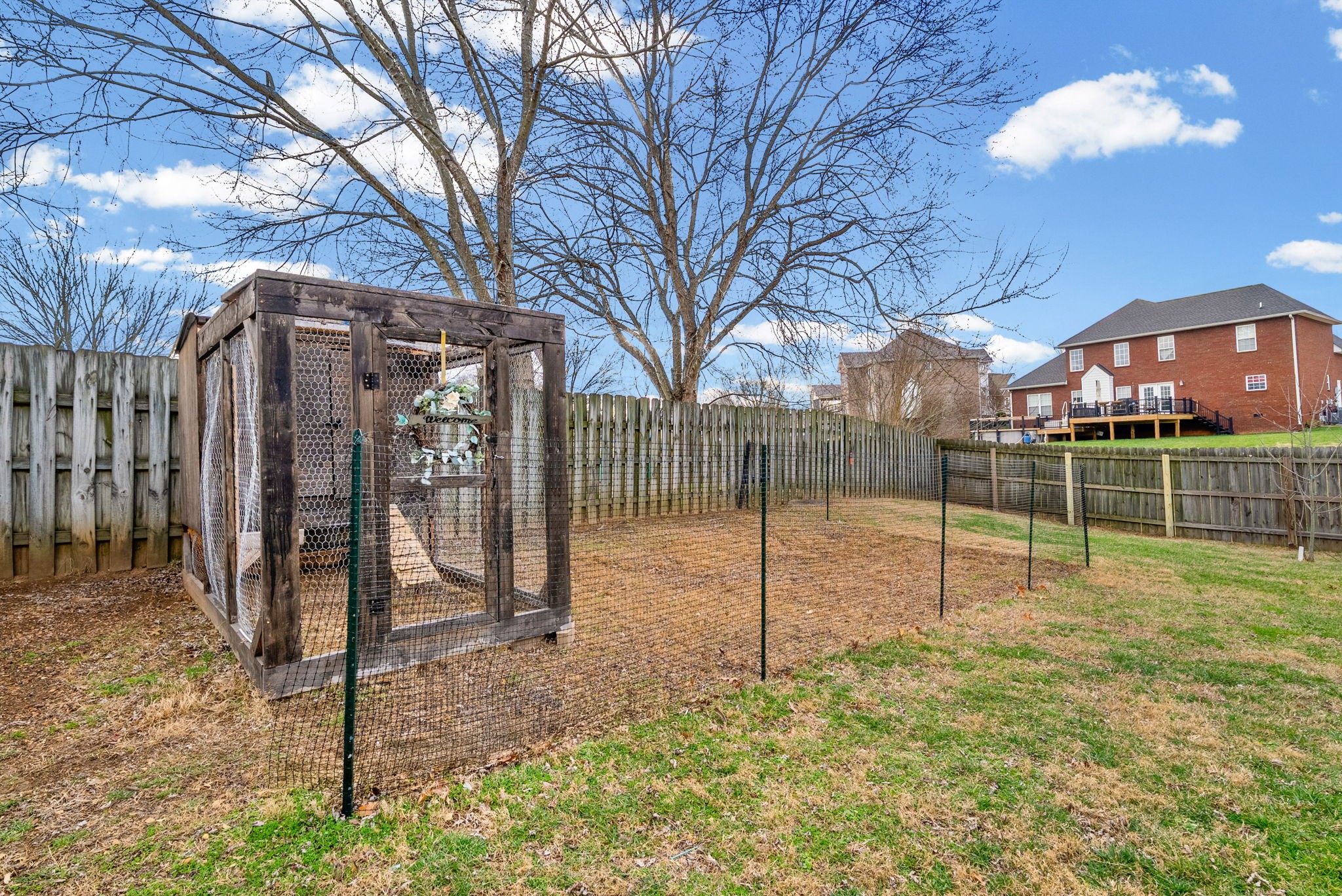 1026 Bluejay Lane Adams, TN 37010 - Photo 46 of 56 a backyard of a house with lots of green space