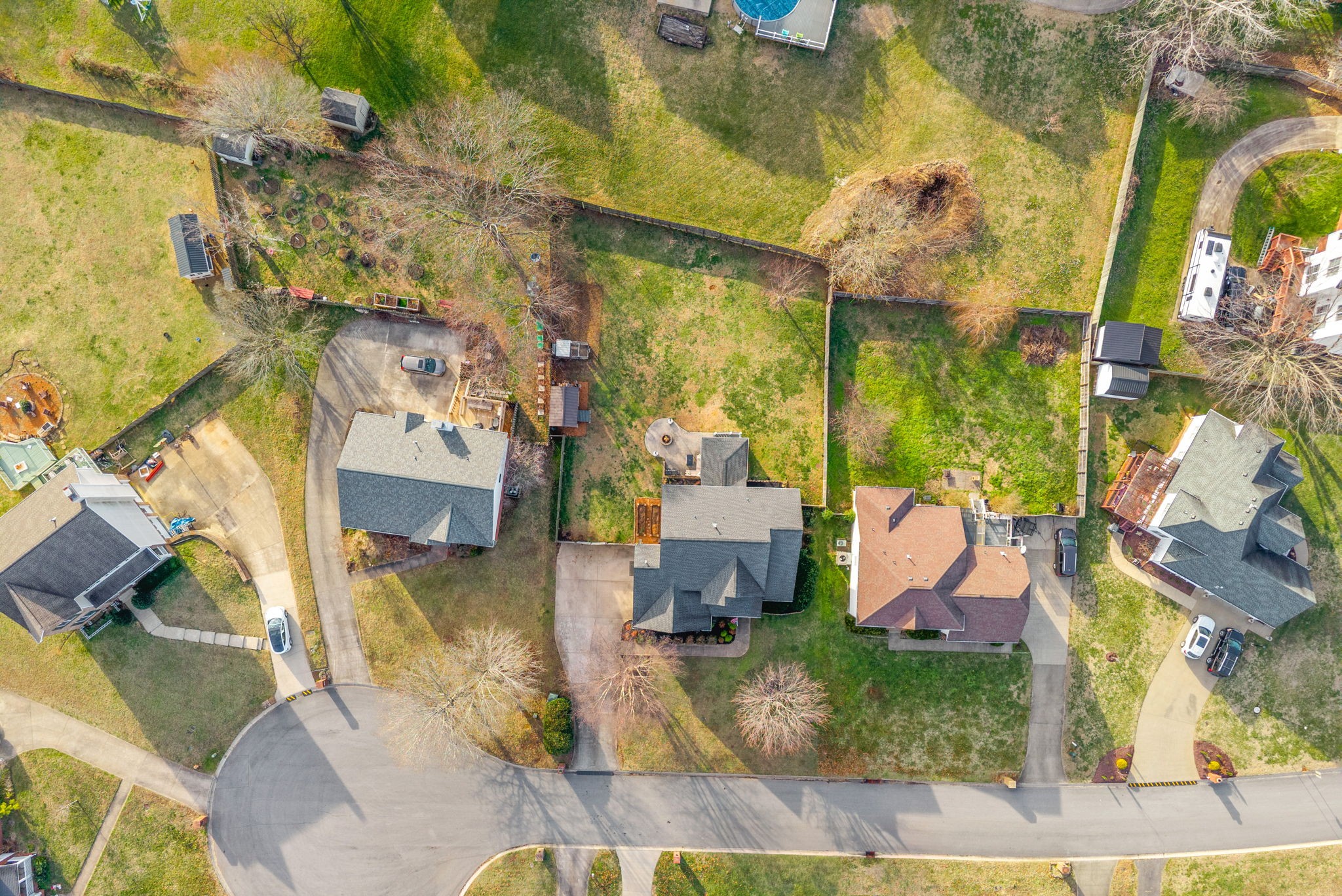1026 Bluejay Lane Adams, TN 37010 - Photo 52 of 56 a backyard of a house with table and chairs