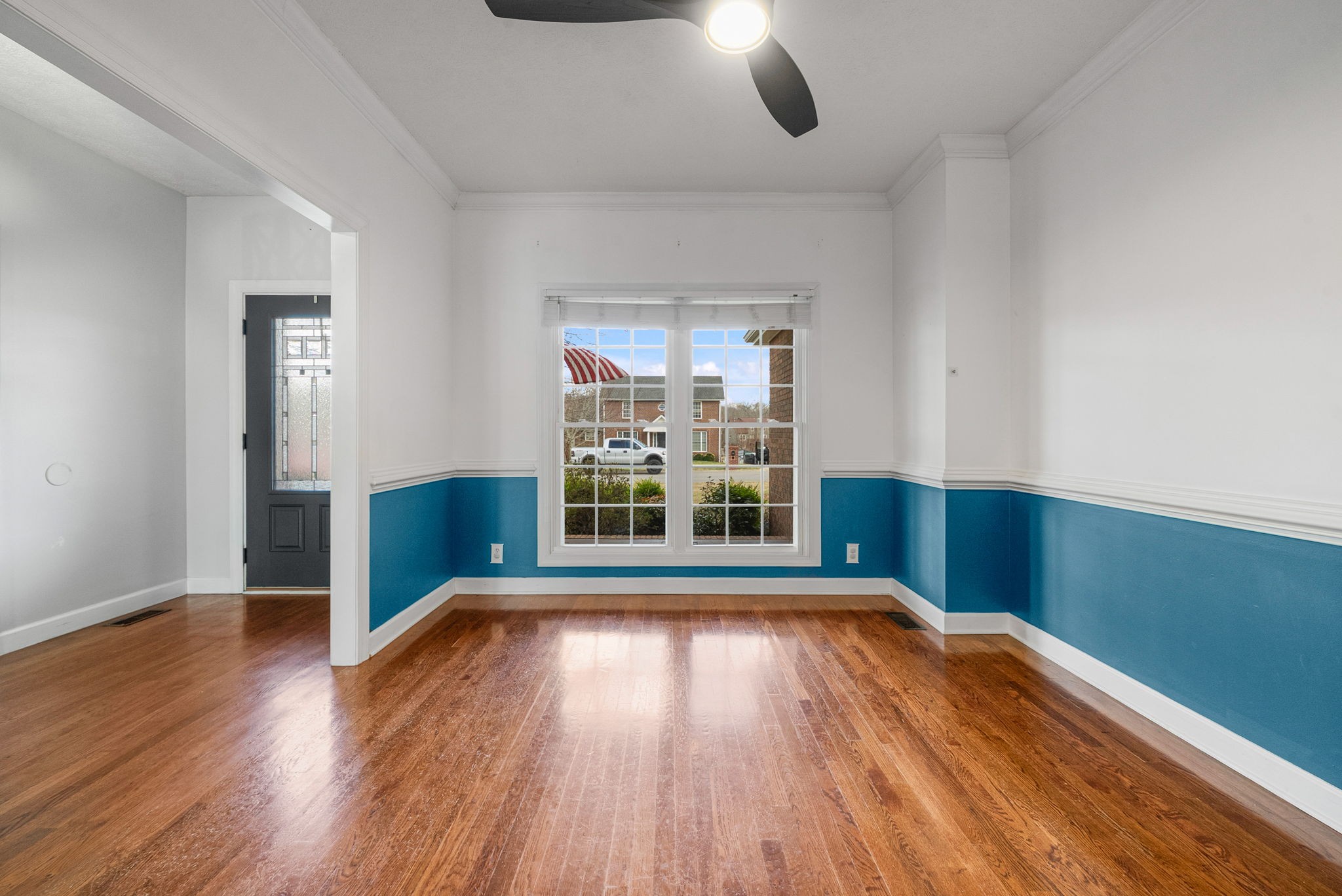 1026 Bluejay Lane Adams, TN 37010 - Photo 8 of 56 a view of a room with wooden floors and windows