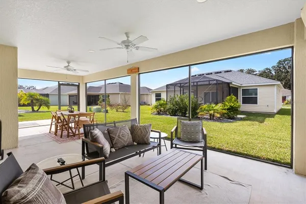 a outdoor living space with furniture and garden view