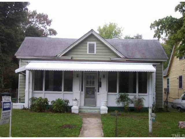 105 State Raleigh, NC 27601 - Photo 1 of 1 a front view of a house with a yard and potted plants