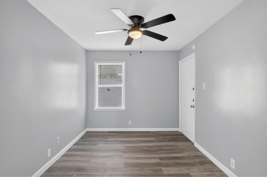 4721 Tremont Street Dallas, TX 75246 - Photo 19 of 22 a view of empty room with wooden floor