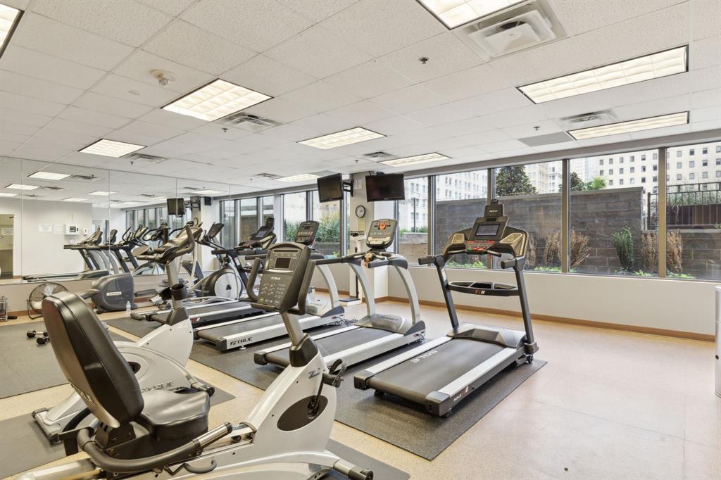 1200 Main Street, Unit 2302 Dallas, TX 75202 - Photo 18 of 22 a view of a room with gym equipment